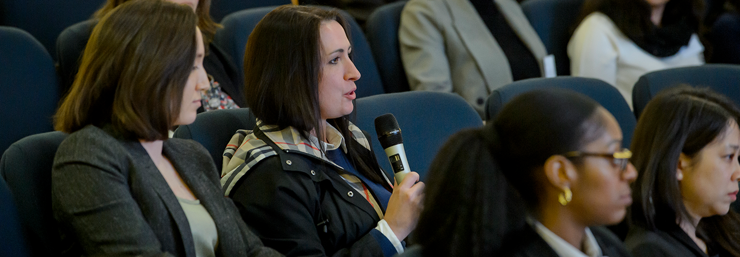 Audience members asks question