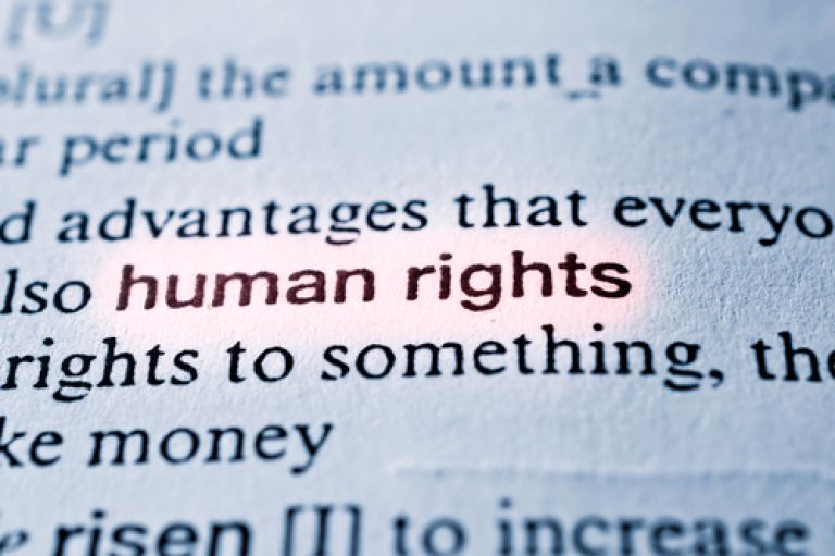 Human rights concept in word tag . Selective focus in the middle of word