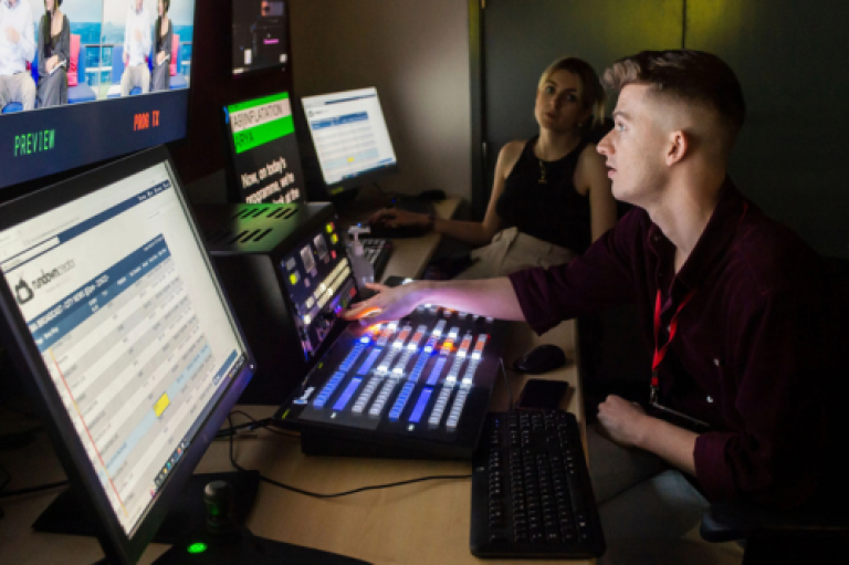 students in journalism studio