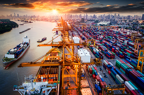 Shipping containers at a busy port