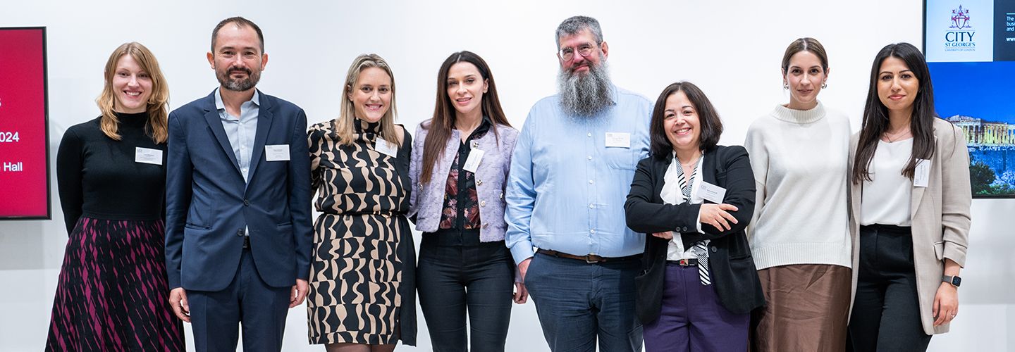 Members of the board with Alumni Relations team