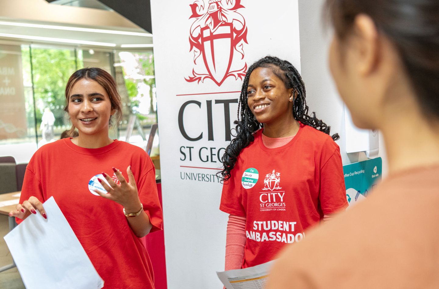 Three female City St George's students at Northampton Square.