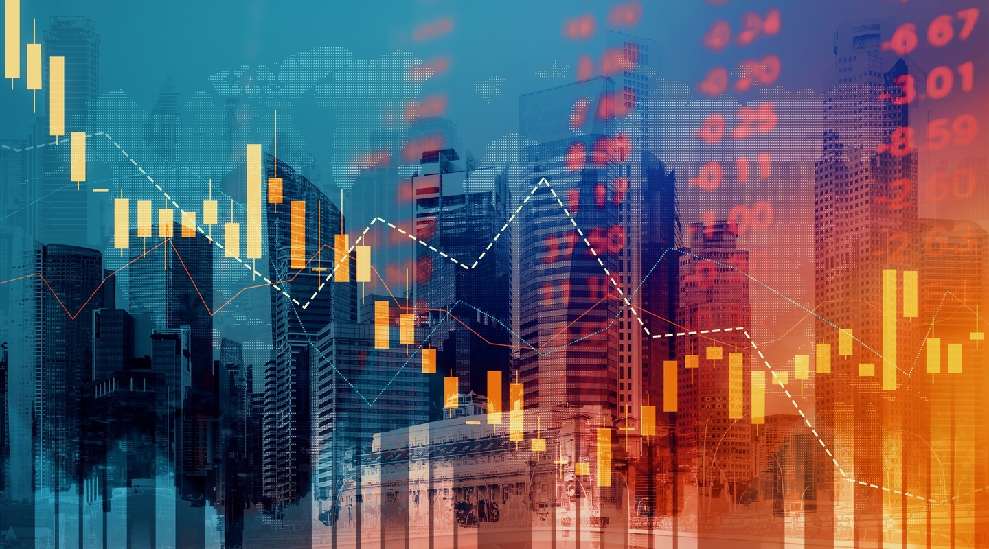 Night time in a financial district with data graph overlaid